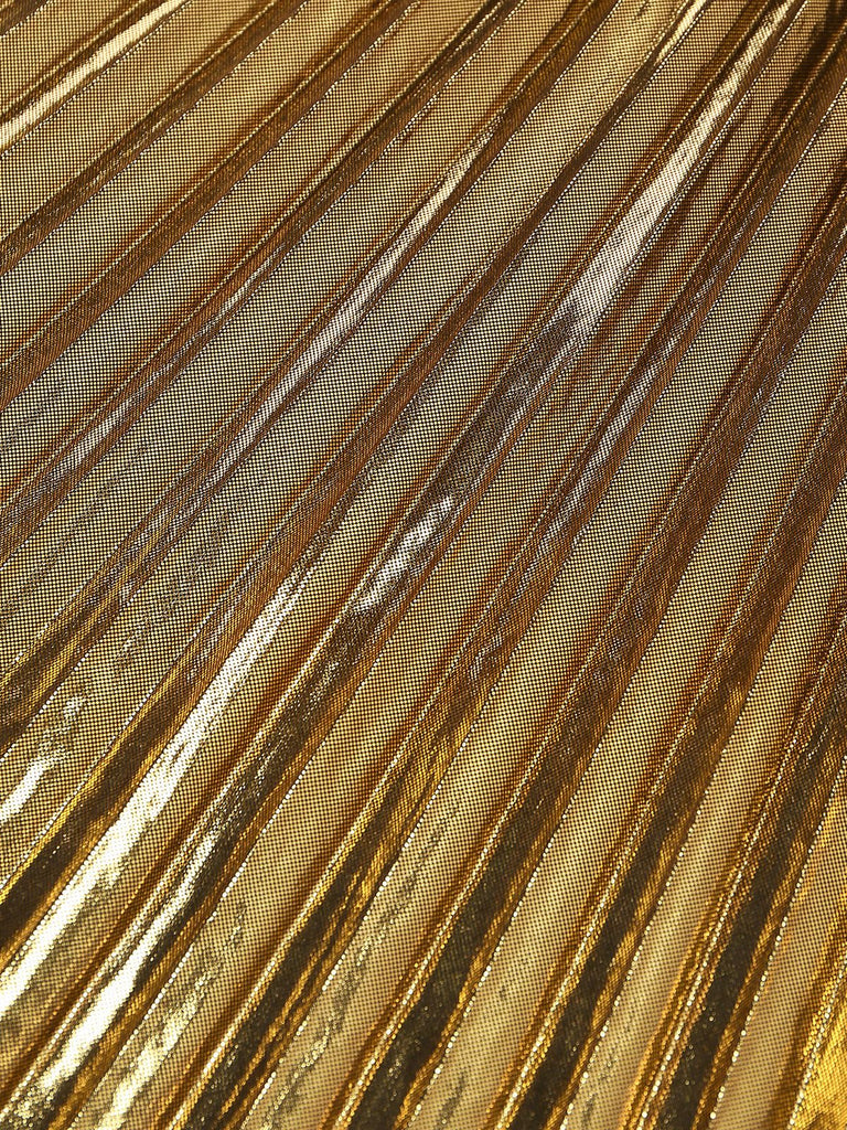 Close-up of gold and bronze metallic fabric texture