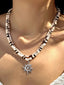 Collier plusieurs rangs pendentif soleil perles blanches et brunes