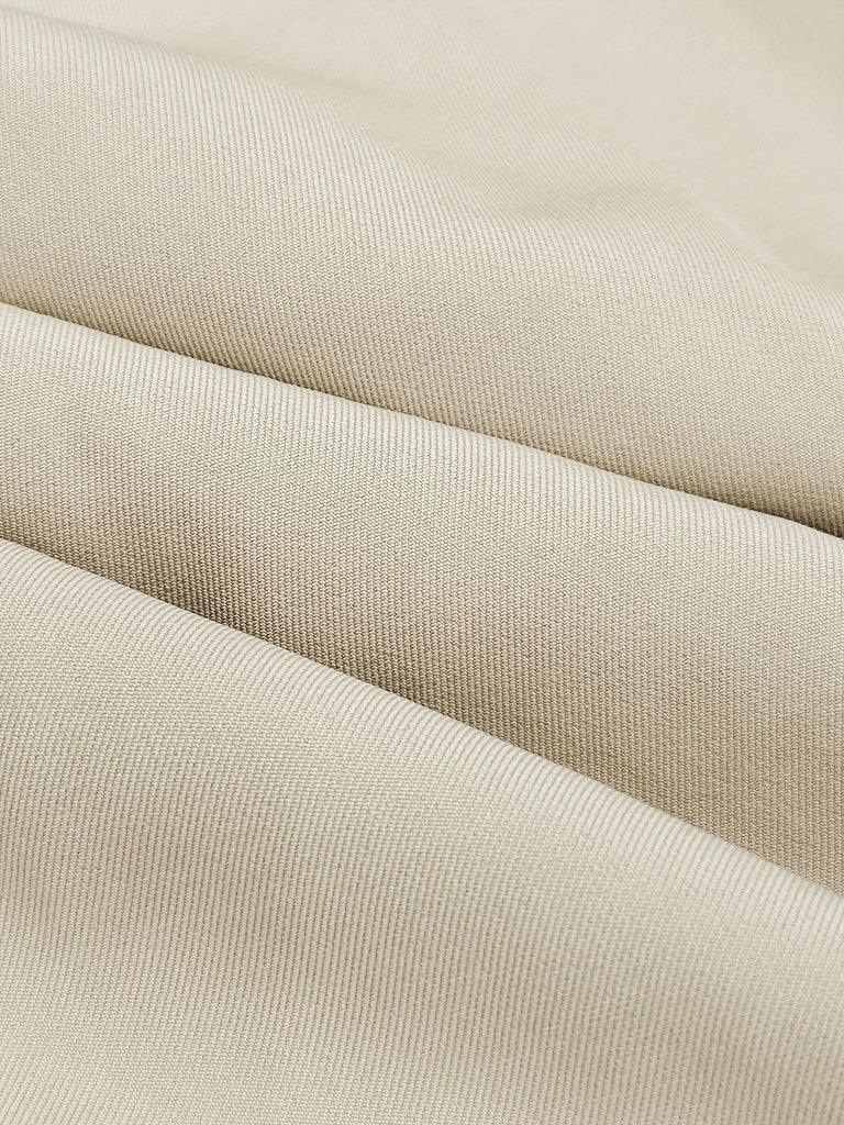 Close-up of beige fabric with a subtle texture