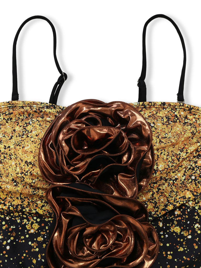 Gold clutch with a large brown rose embellishment on a white background