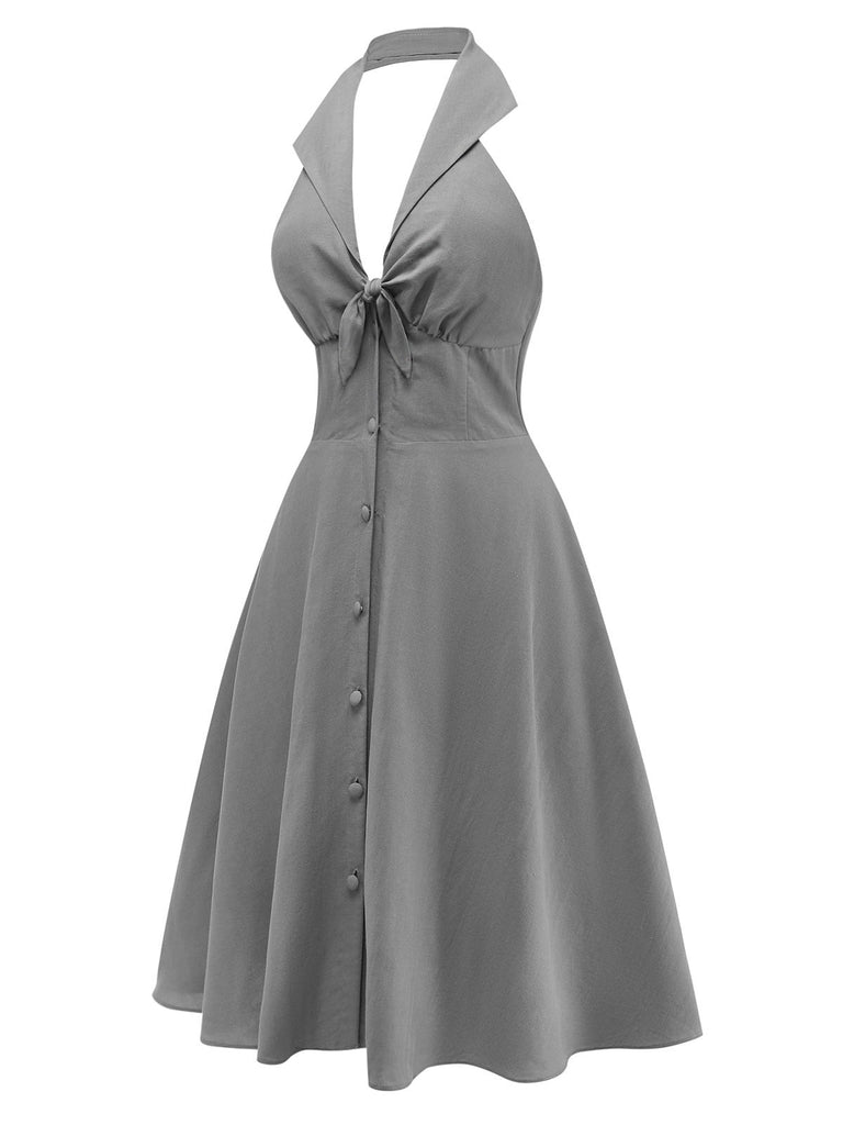 Gray halter V-neck dress side view showing flattering silhouette and elegant neckline design