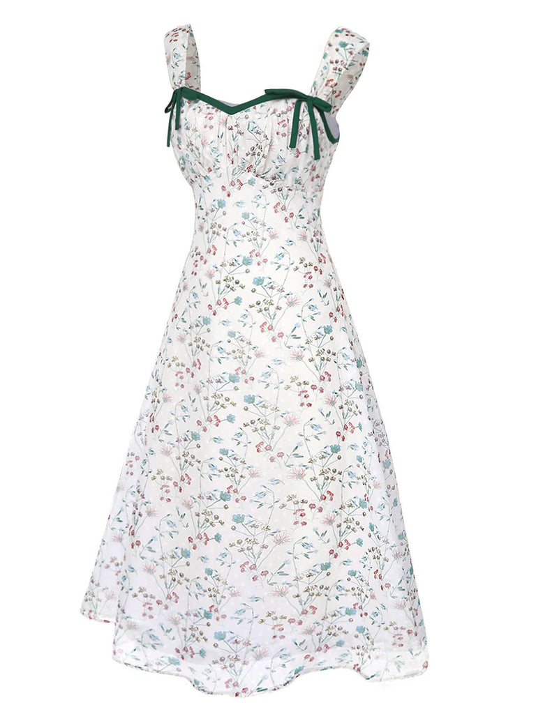 Floral dress with green straps on a white background