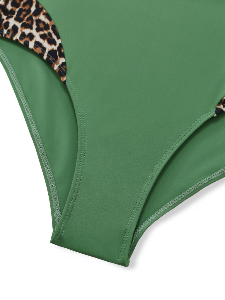 Green 1950s vintage leopard print swimsuit bottom detail showing retro cut and classic animal pattern design perfect for rockabilly beach style and vintage swimwear collections