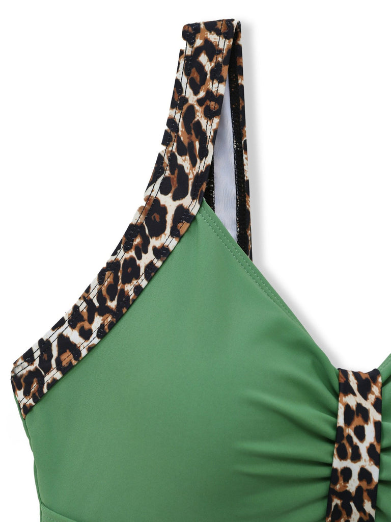 Green 1950s vintage leopard print swimsuit suspender details showcasing adjustable straps and retro hardware design ideal for authentic pin-up poolside looks
