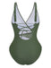 Green swimsuit with criss-cross straps on a white background