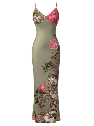 Green dress with floral and paisley patterns on a white background