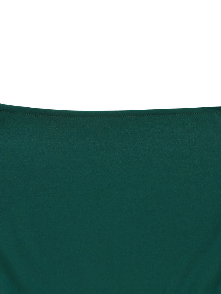 Close-up of a dark green fabric texture on a white background
