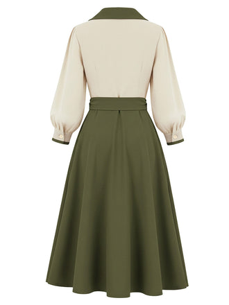 Green and beige dress with a belt on a white background