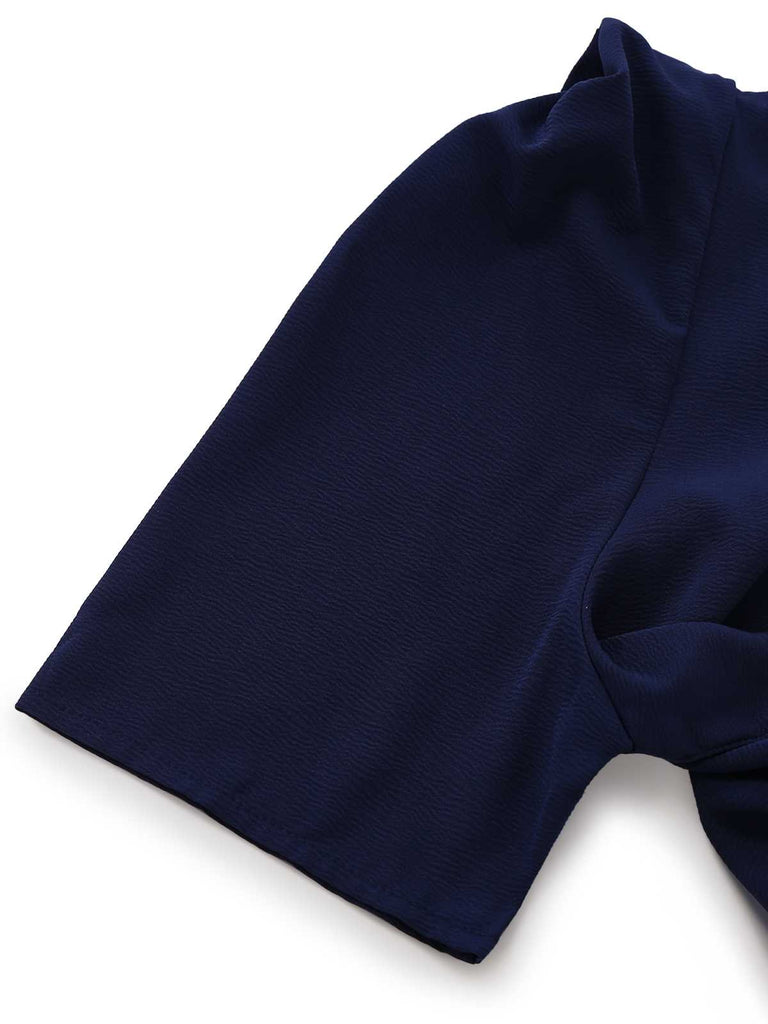 Combinaison bleu marine unie à ceinture années 1980