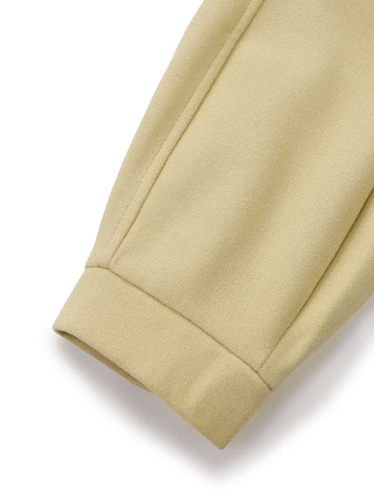 Manteau croisé à revers jaune des années 1930