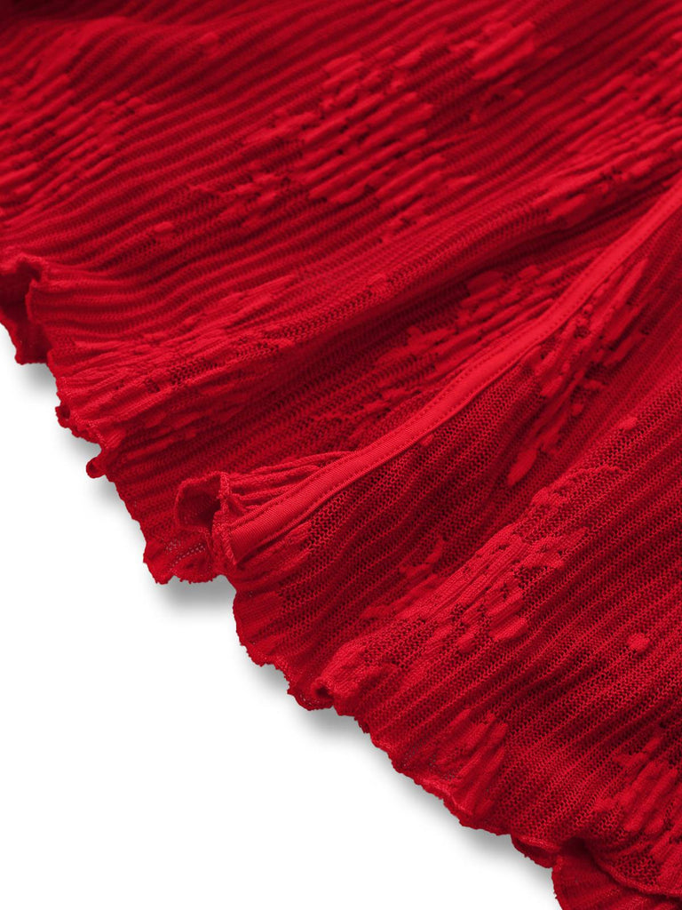 Robe en maille rouge à manches cloche et nœud floral style années 1960