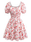 Robe manches bouffantes imprimé fleurs roses taille smockée des années 1950