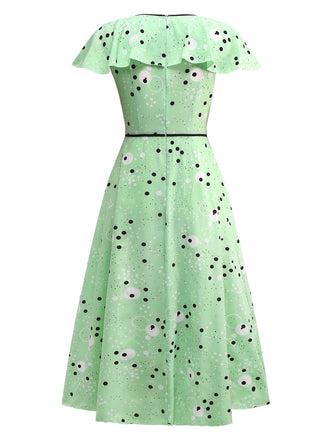 Robe à pois irréguliers à volants et col en V années 1940