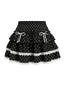 Mini-jupe noire pois dentelle volants 1960s