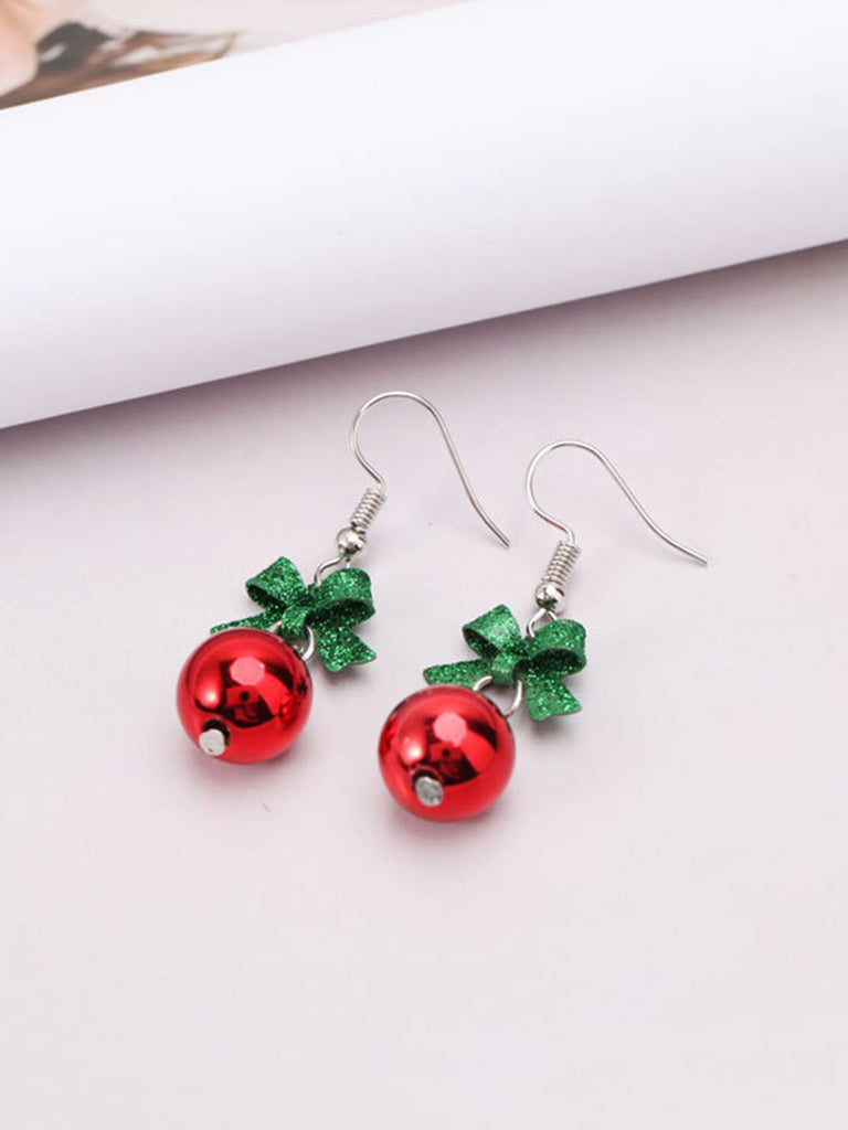 Boucles d'oreilles pendantes en perles rouges avec nœud de Noël