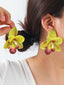 Boucles d'oreilles spectaculaires forme d'orchidée