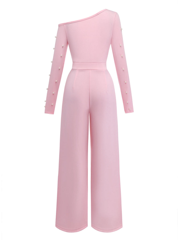 Pink jumpsuit with pearl embellishments on a white background