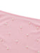 Pink fabric with scattered pearls on a white background