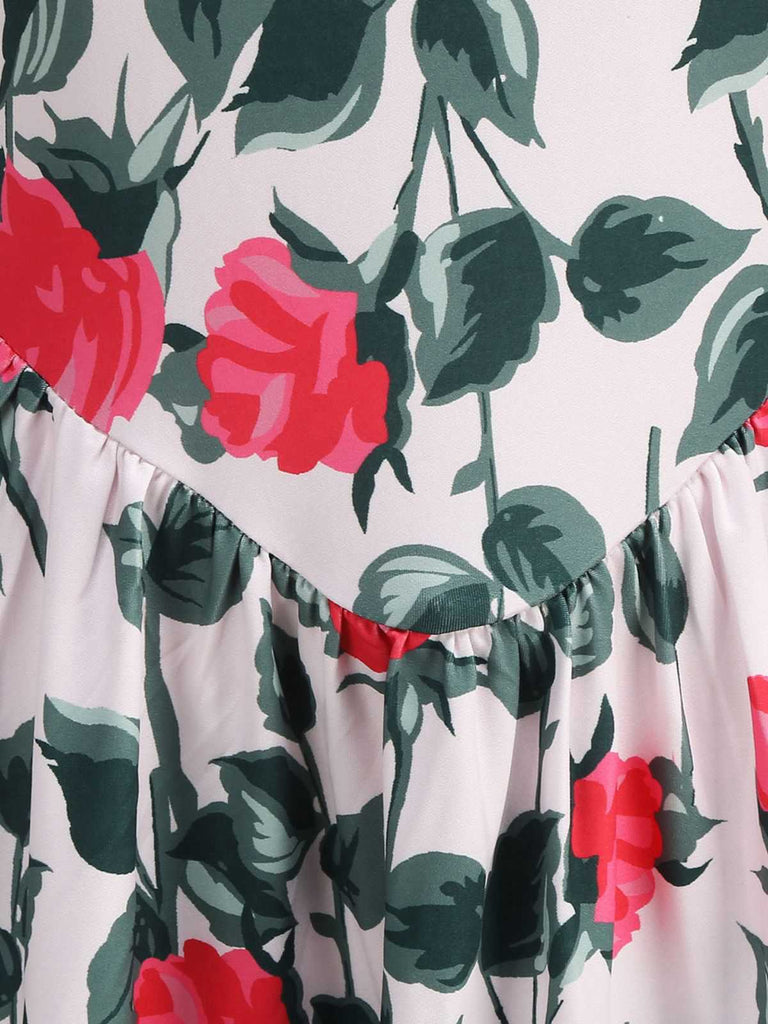 Floral pattern with red flowers and green leaves on a light background