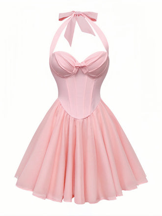 Pink dress with a bow detail on a white background