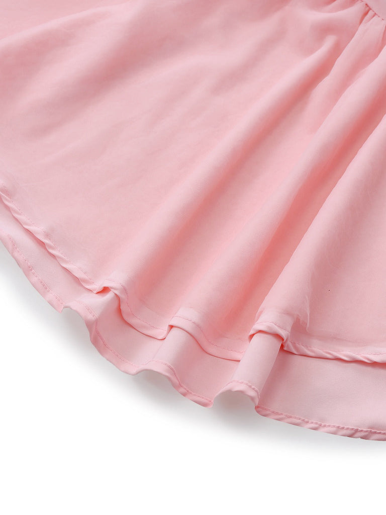 Close-up of a pink skirt with a soft texture on a light gray background