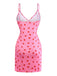 Pink slip dress with red heart pattern on a white background