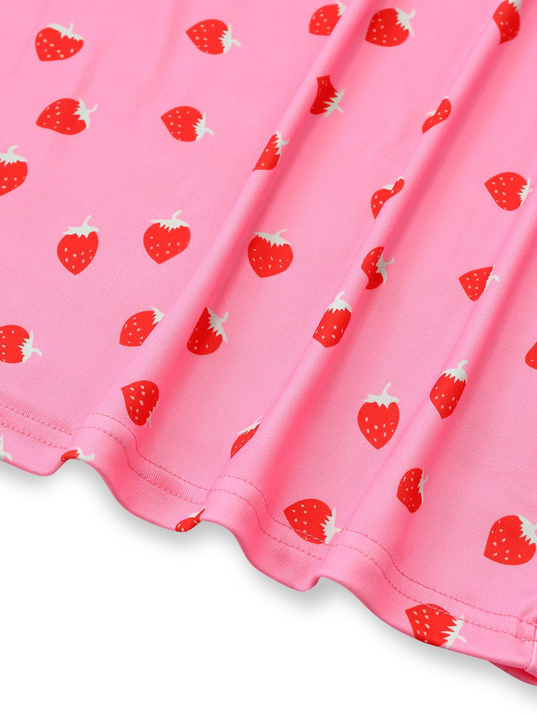Pink fabric with red strawberry pattern
