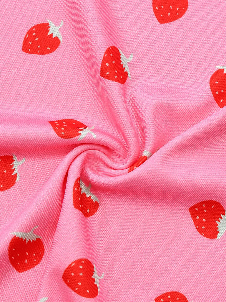 Pink fabric with red strawberry pattern