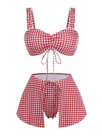 Red and white checkered bikini set on a white background