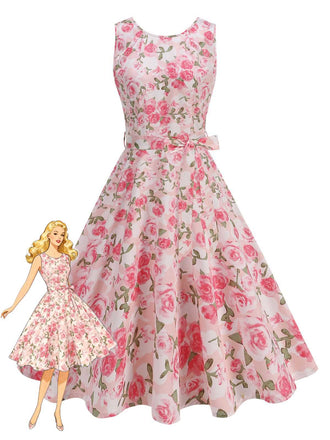 Une robe trapèze sans manches de style vintage, ornée d'un imprimé floral romantique de roses roses sur fond blanc, avec une ceinture assortie.