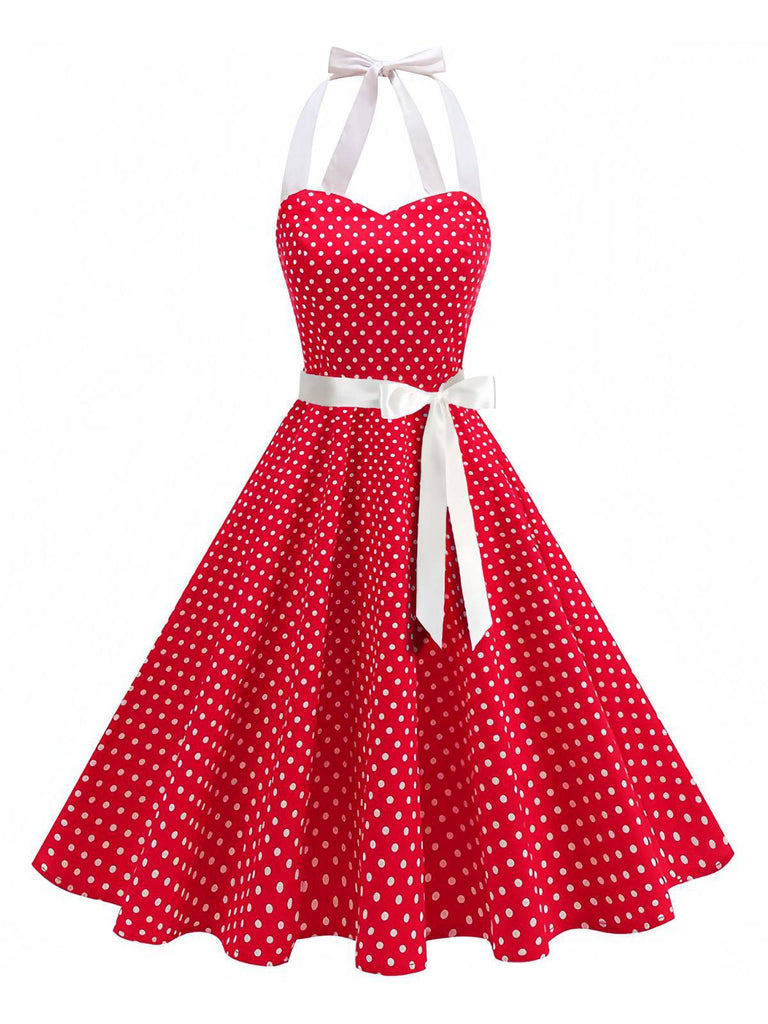 Robe swing ceinturée col halter à pois