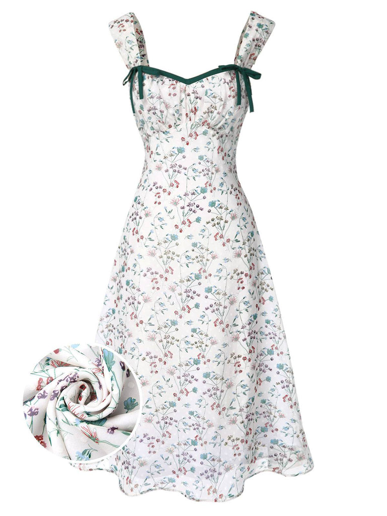 Robe à fleurs avec bretelles vertes sur fond blanc