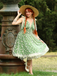 Robe trapèze verte en maille marguerite années 1950