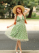 Robe trapèze verte en maille marguerite années 1950