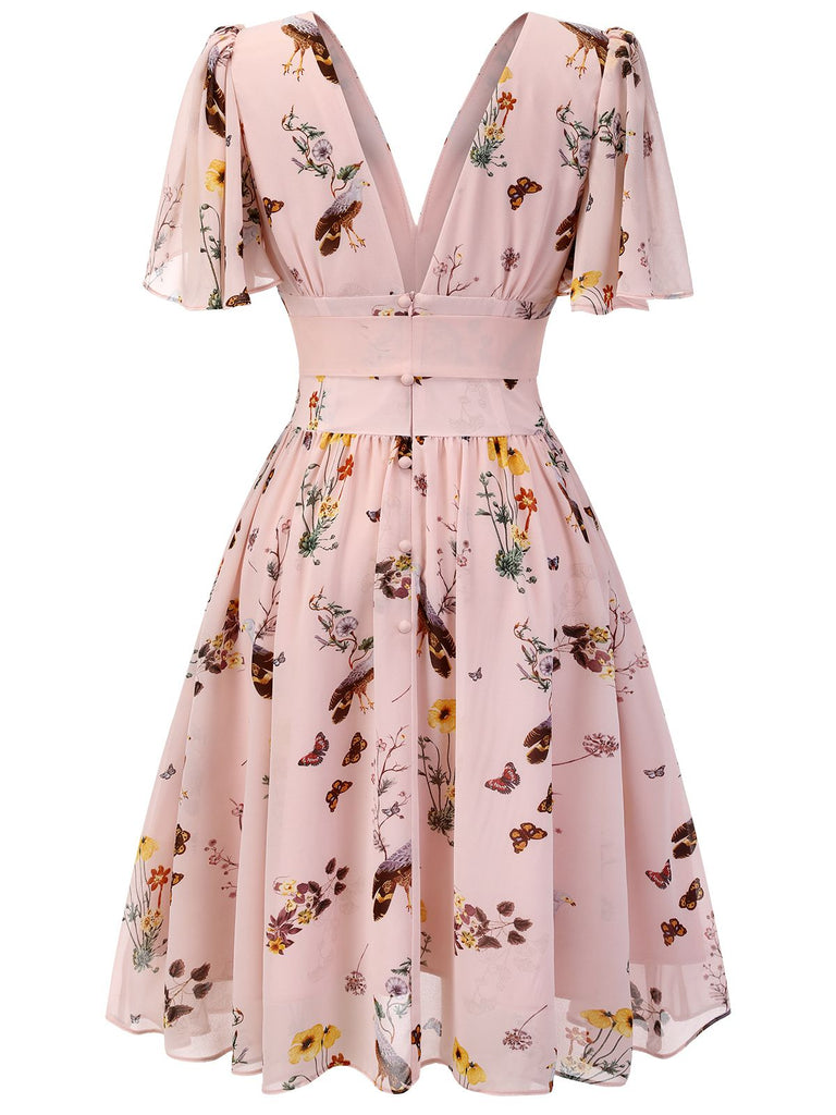 Robe rose à col en V et nœud papillon à fleurs et oiseaux Cocktail Chic