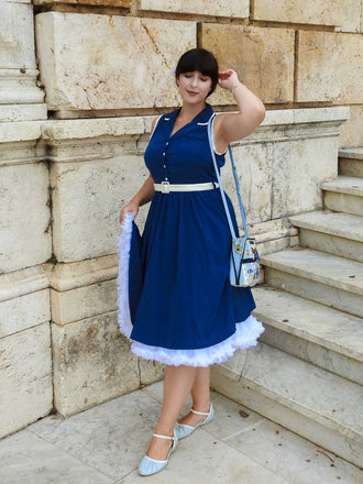 Robe à revers sans manches bleu marine des années 1960