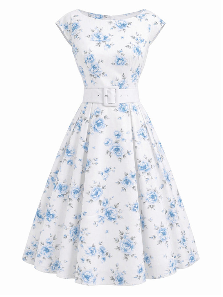 Robe jaune à fleurs col bateau ceinturée années 1950