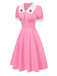 [Prévente] Robe rose en coton brodée fraises manches bouffantes dannées 1950