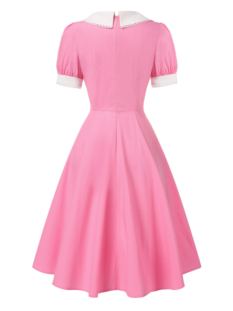 [Prévente] Robe rose en coton brodée fraises manches bouffantes dannées 1950