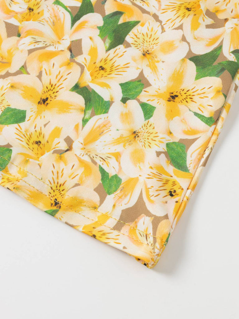 Robe jaune à fleurs froncées et lacées dans le dos des années 1960