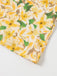 Robe jaune à fleurs froncées et lacées dans le dos des années 1960