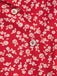 Chemisier rouge à fleurs à revers avec nœud des années 1950