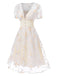 Robe blanche à fleurs brodées col V profond années 1950