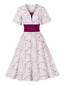 Robe fleurie manches cloche et décolleté en cœur Rose Viole des années 1950