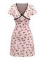 Robe rose en maille col V imprimé nœuds des années 1960