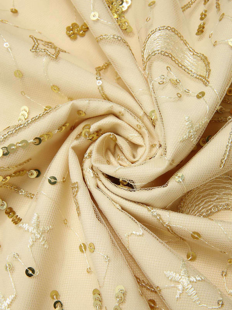 [Prévente] Robe champagne en maille pailletée avec collier perles années 1920