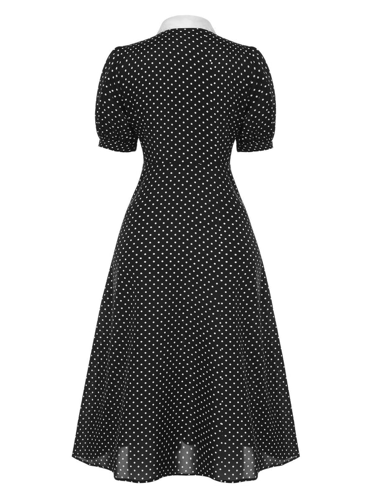 Robe noire à pois et col noué des années 40