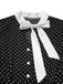 Robe noire à pois et col noué des années 40