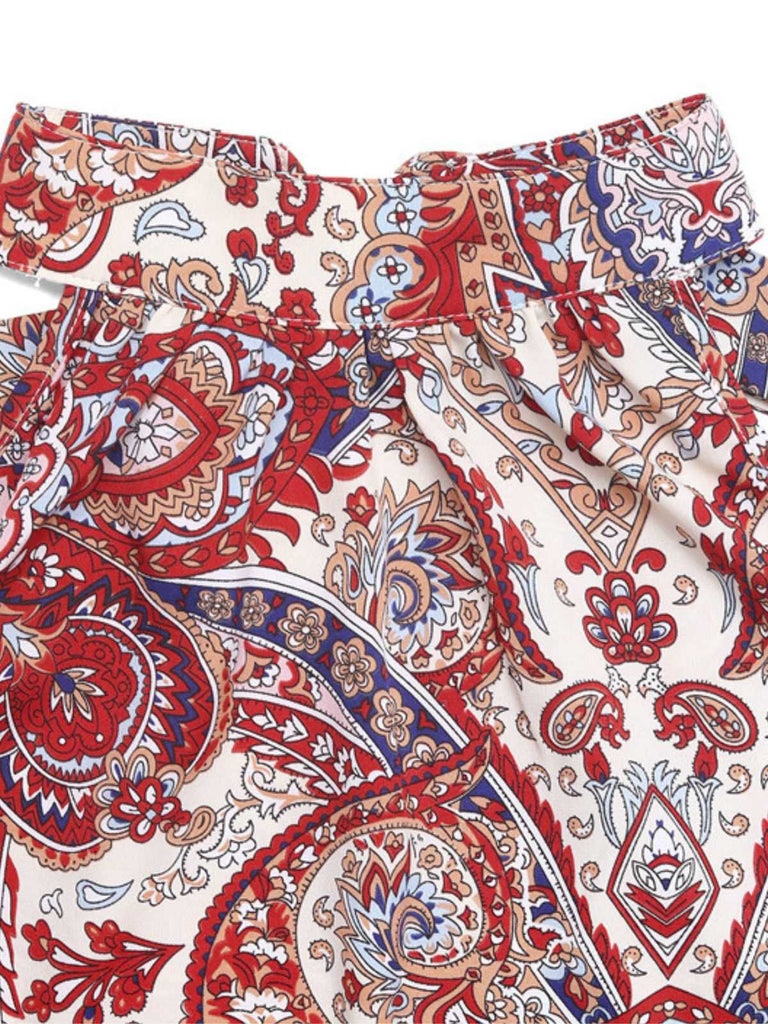 Robe rouge à franges style bohème des années 1970