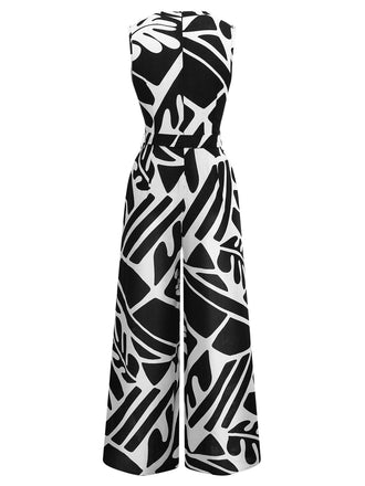 Combinaison ceinturée noire et blanche à motif de plantes des années 1950